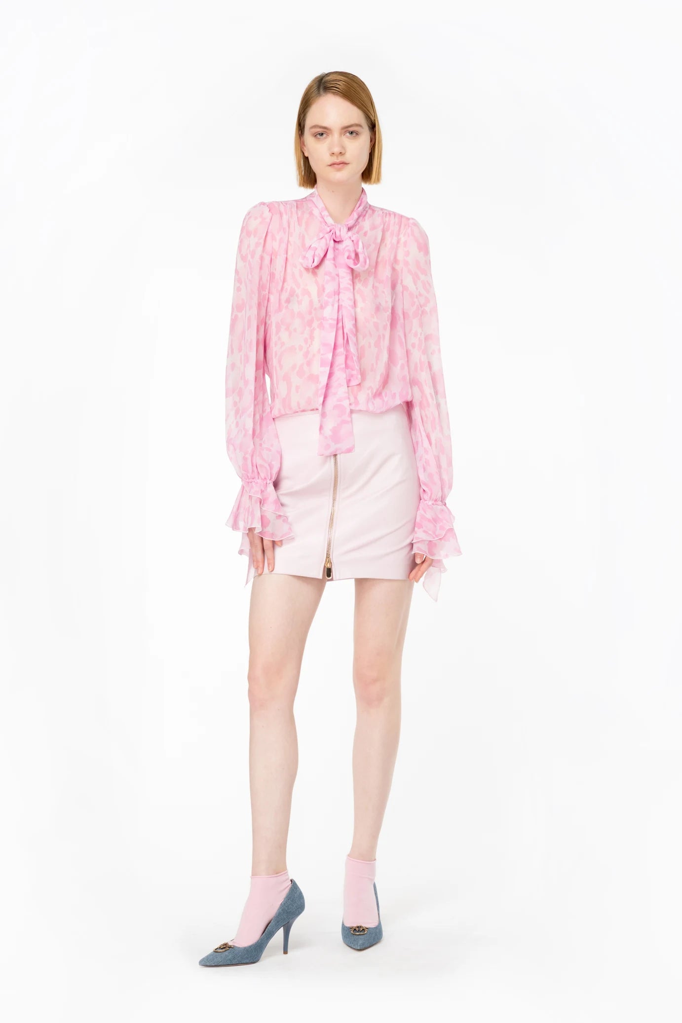 Pink leather mini skirt