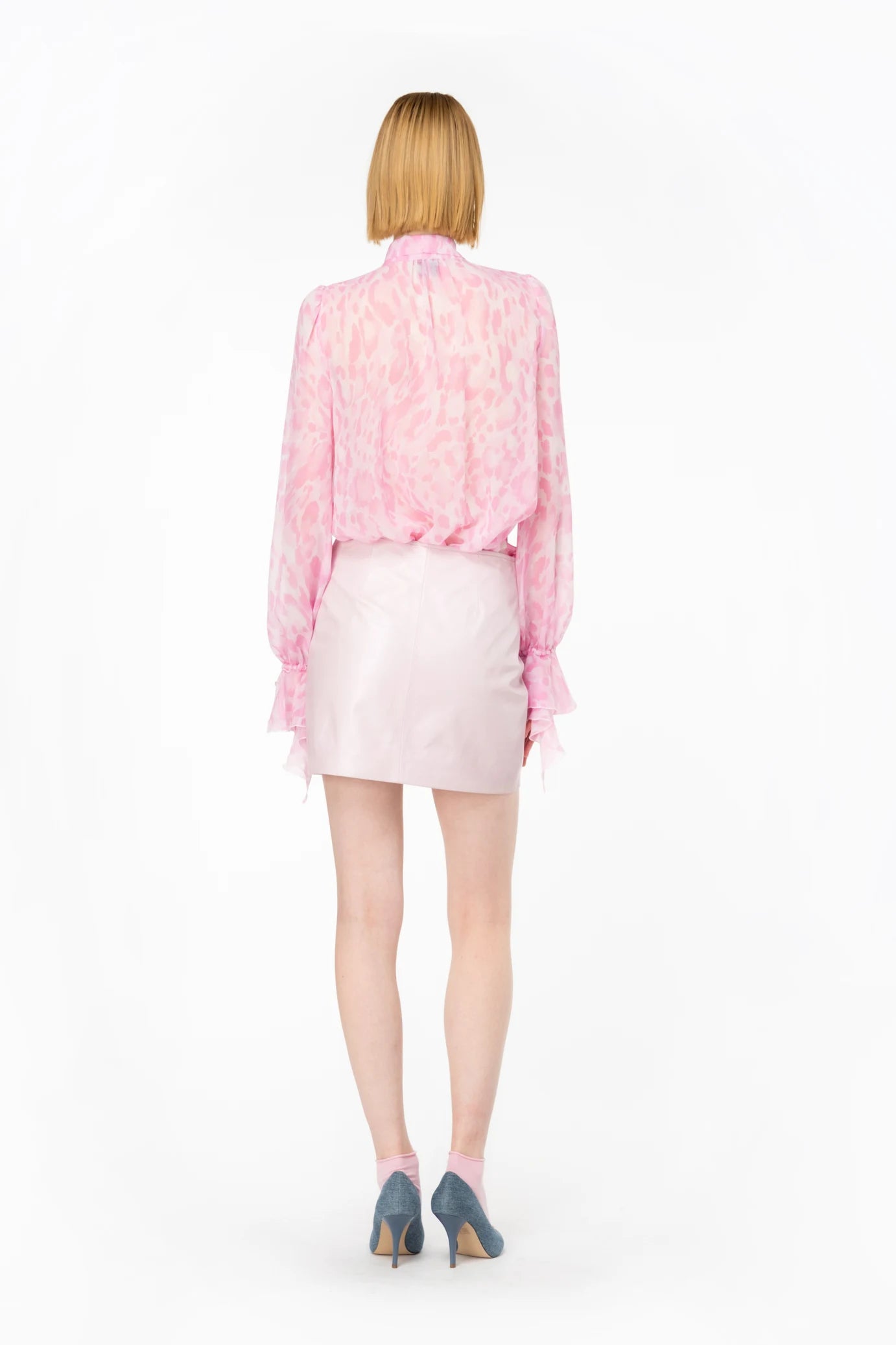 Pink leather mini skirt