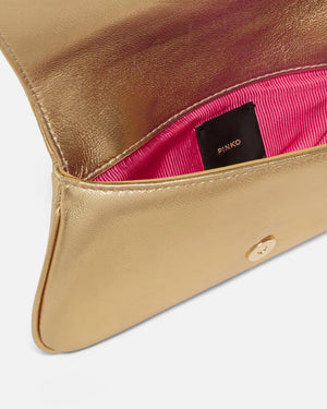 Gold clutch style bag with wrist bracelet