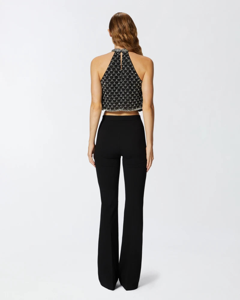 Black sleeveless top embroidered with crystals
