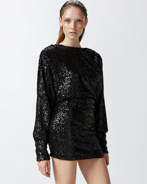 Black sequin mini dress with long sleeves and open back