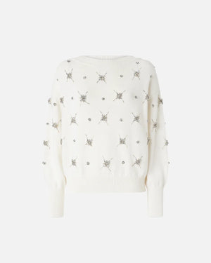 White sweater with embroidered rhinestone stars