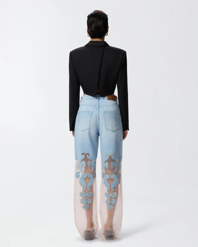 Denim jeans with applique and organza