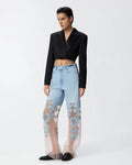 Denim jeans with applique and organza