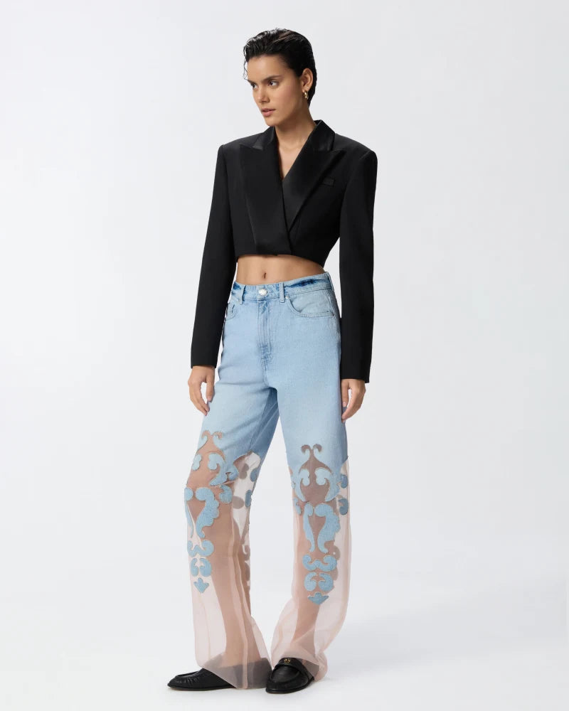 Denim jeans with applique and organza