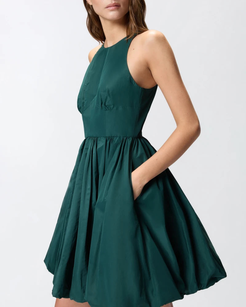 Green sleeveless dress with balloon skirt