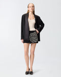 Black mini skirt with embroidered rose applique