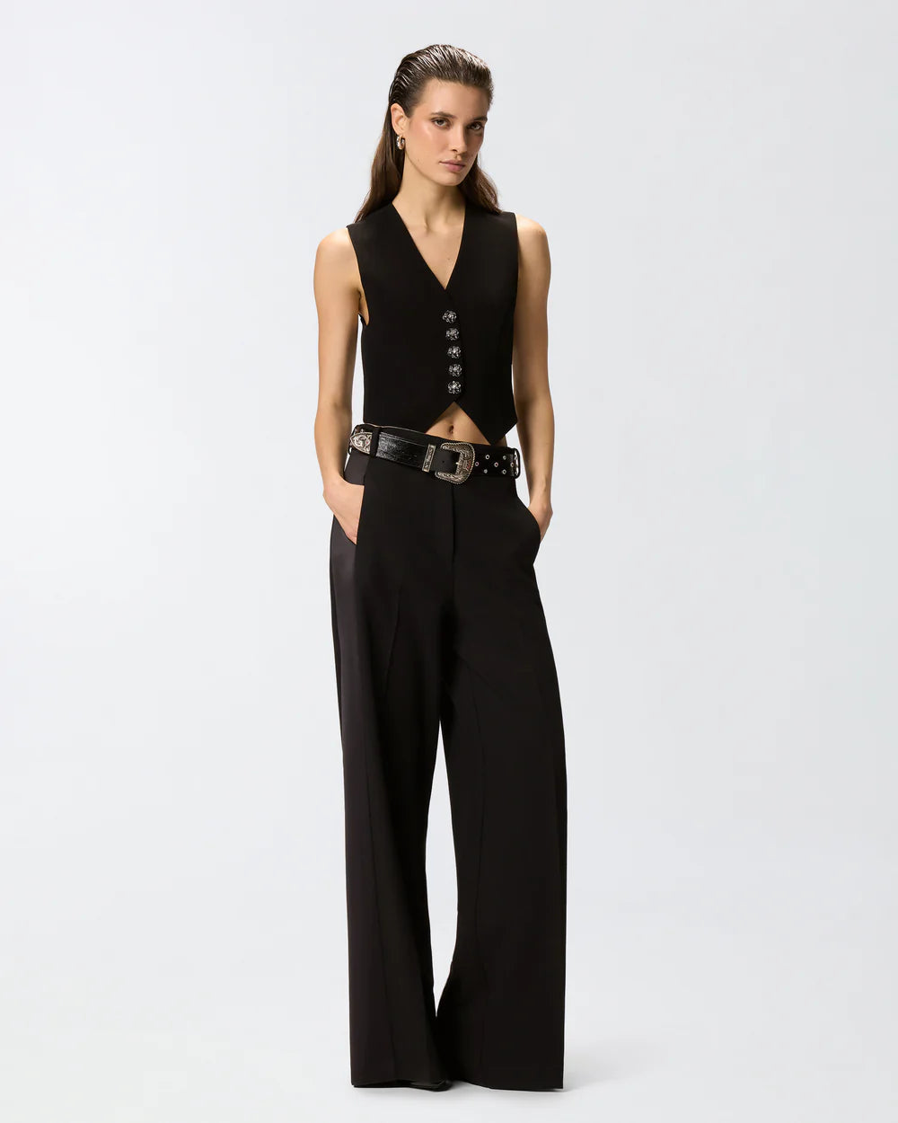Black vest with rose buttons