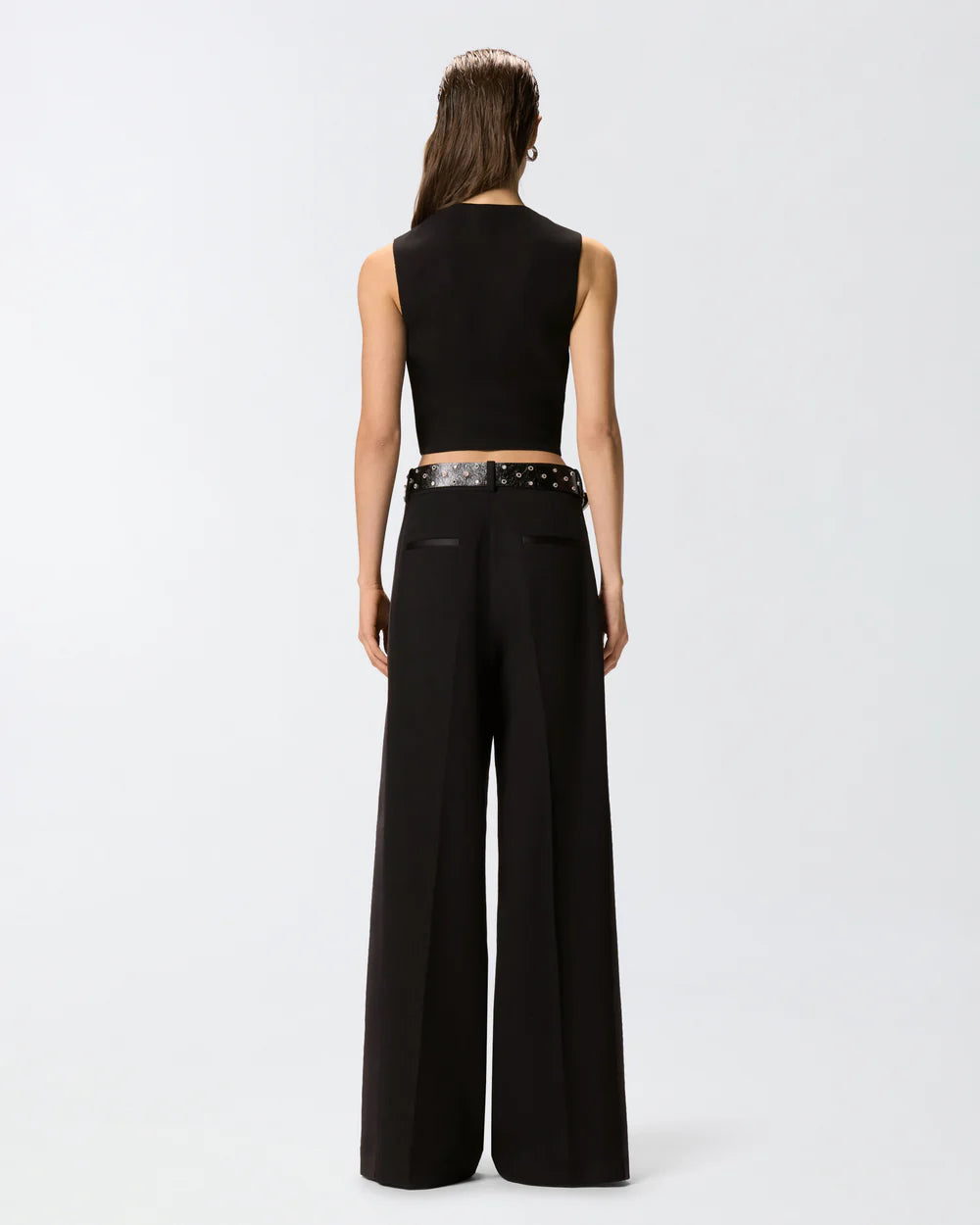 Black vest with rose buttons