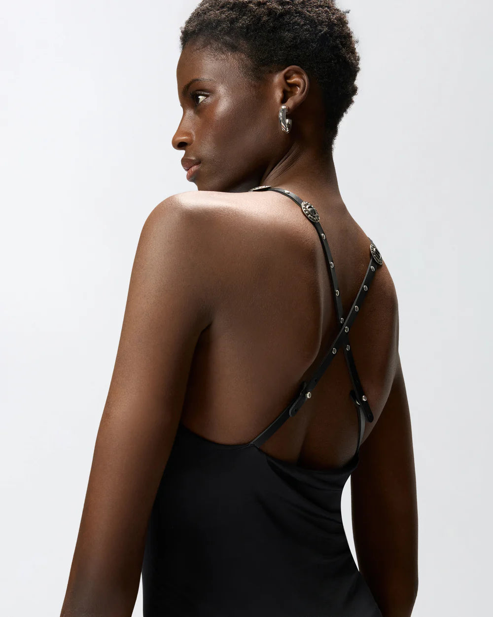 Black jersey midi dress with leather straps