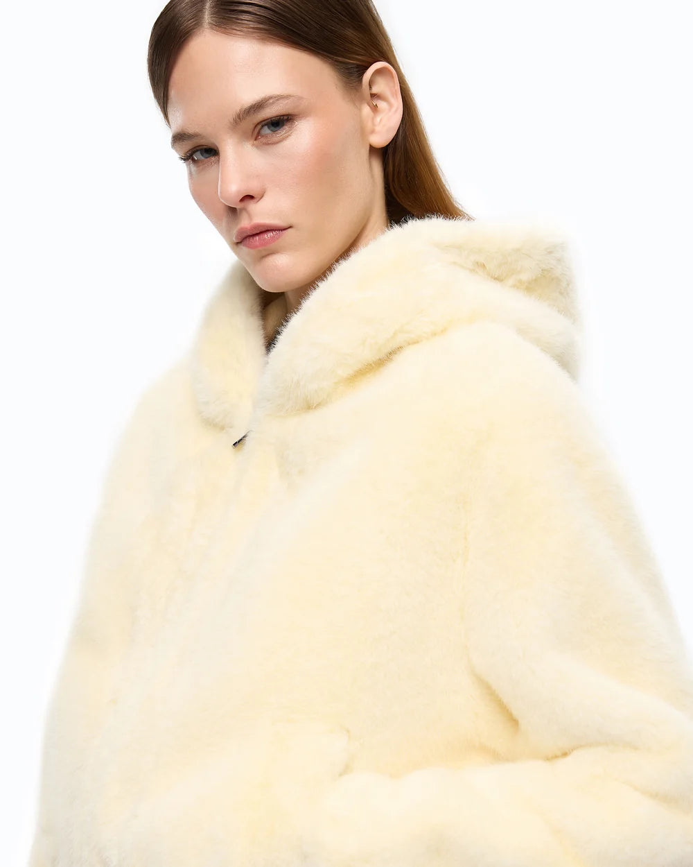 Ivory faux fur cropped jacket with a hood