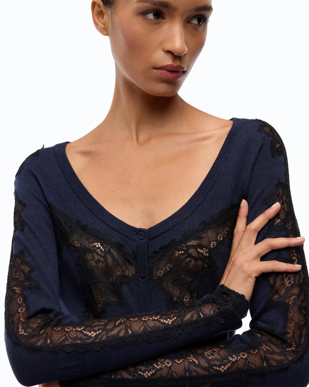 Navy cardigan with lace inserts and round neck