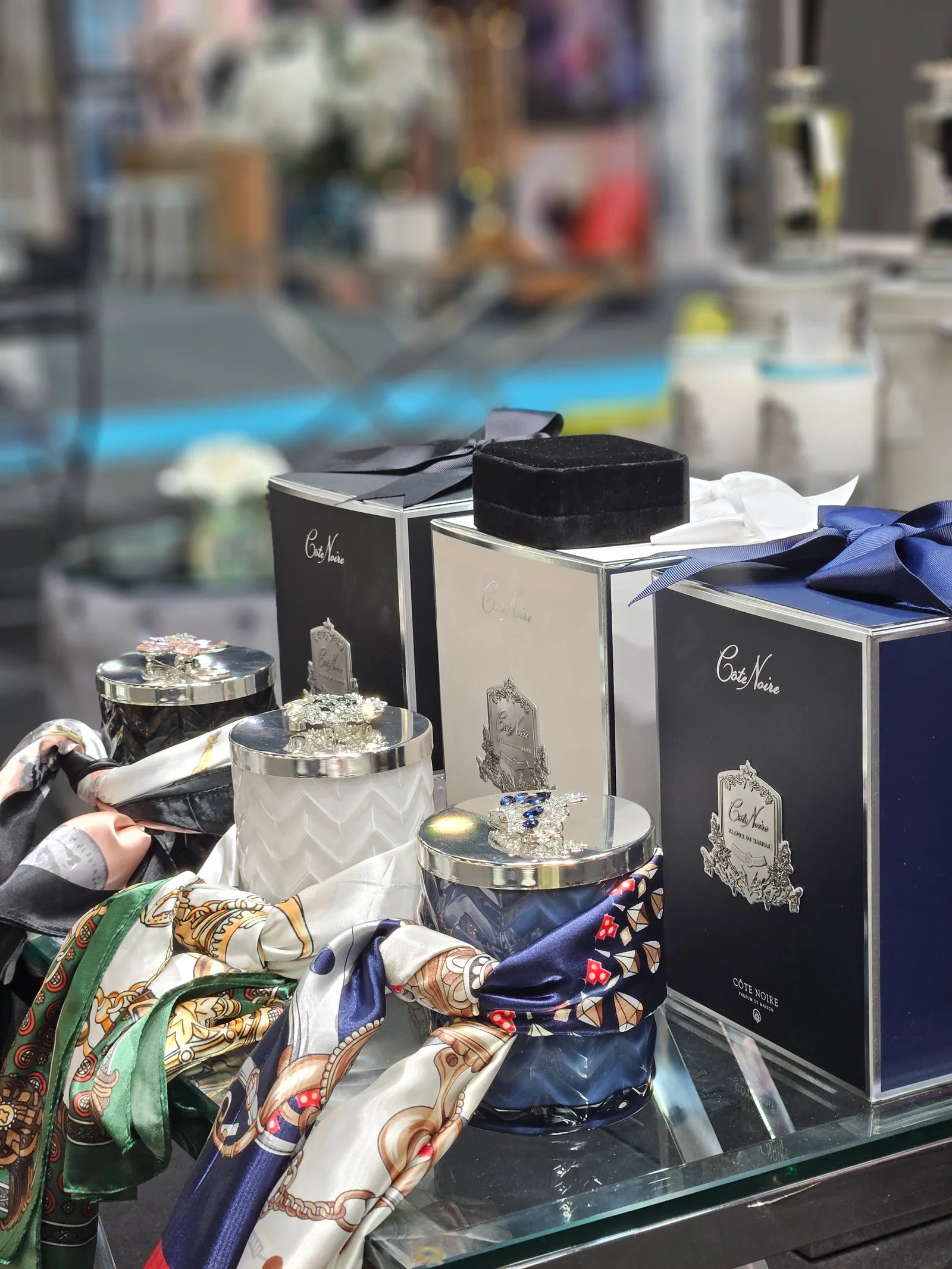 Black herringbone candle with scarf and a flower silver lid broach