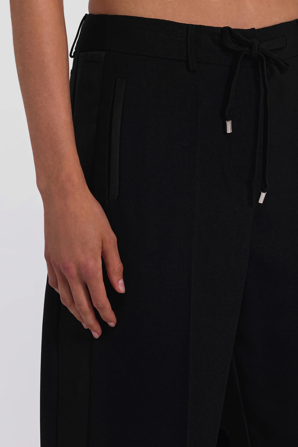 Black relaxed tuxedo pants with satin inserts and drawstring