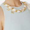 Aqua A-line mini dress with scarf on the neckline