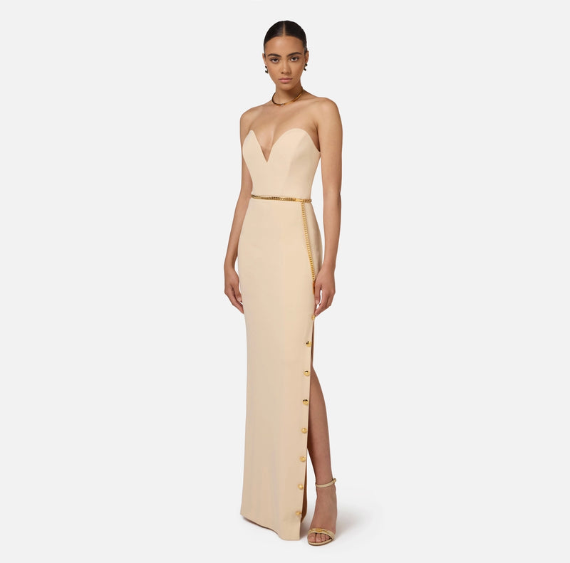 Ivory column strapless dress with gold buttons on the side and chain belt