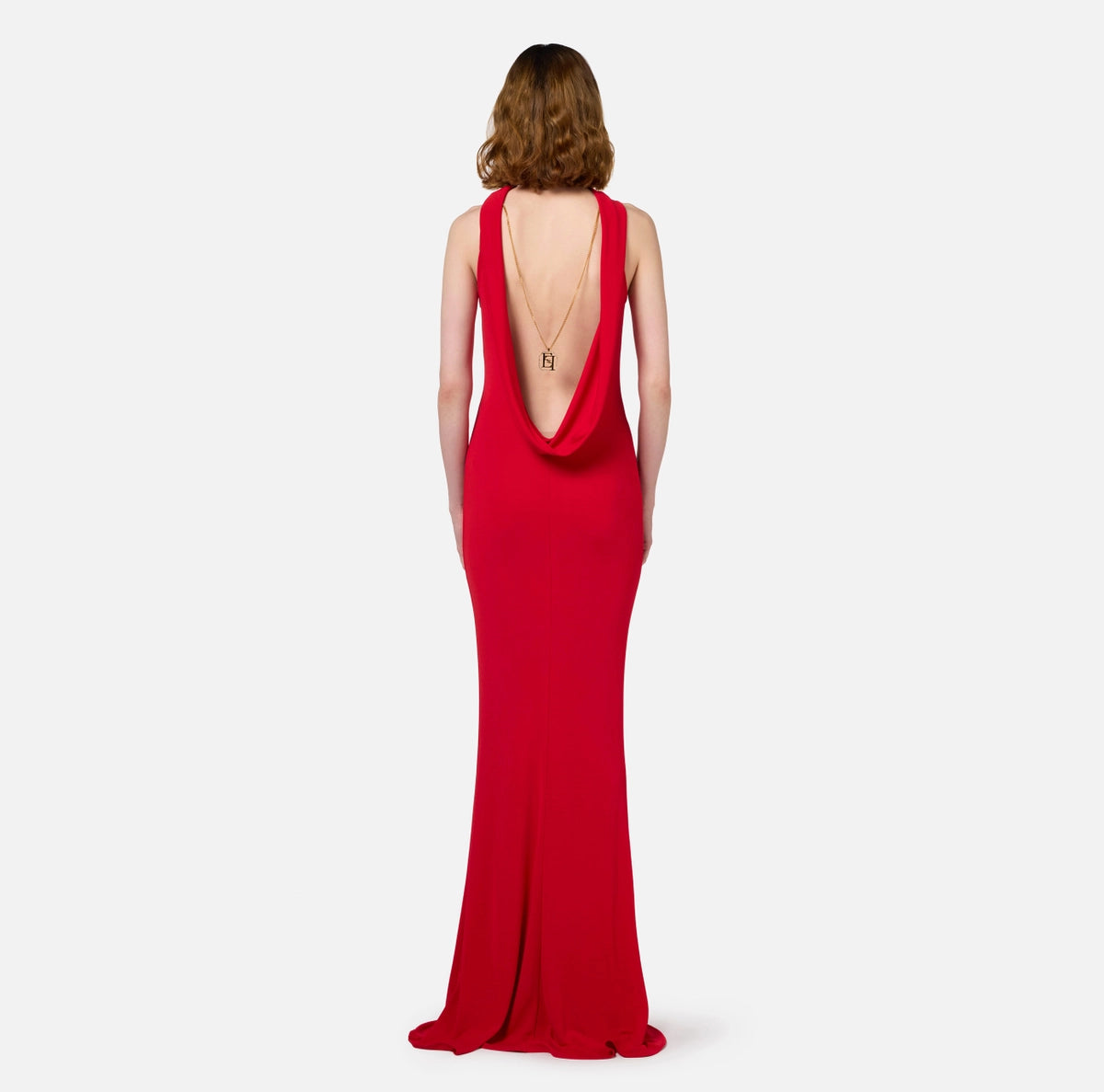 Red jersey mermaid style gown with back necklace