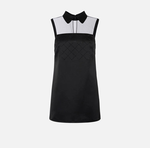 Black dress in duchess satin with tulle and rhinestones