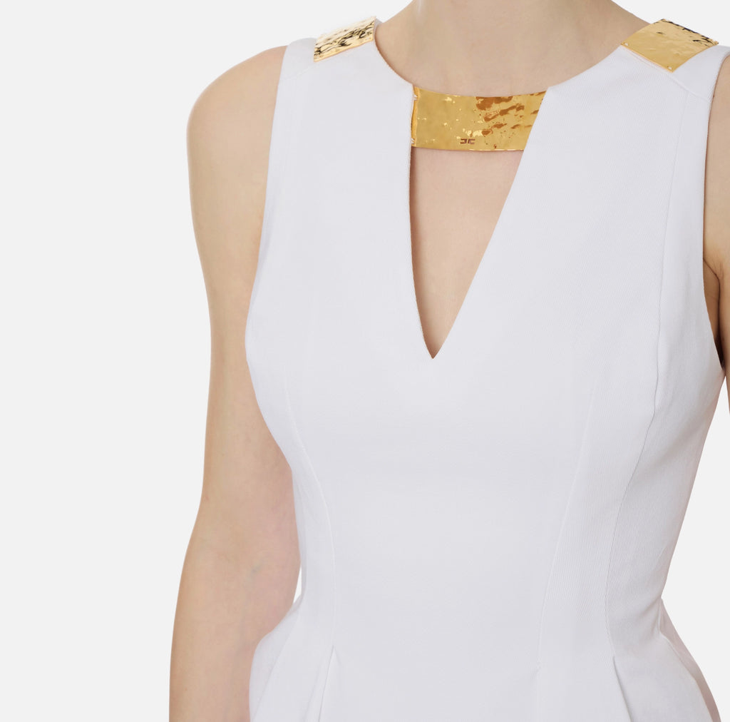 Ivory cotton mini dress with gold plaque