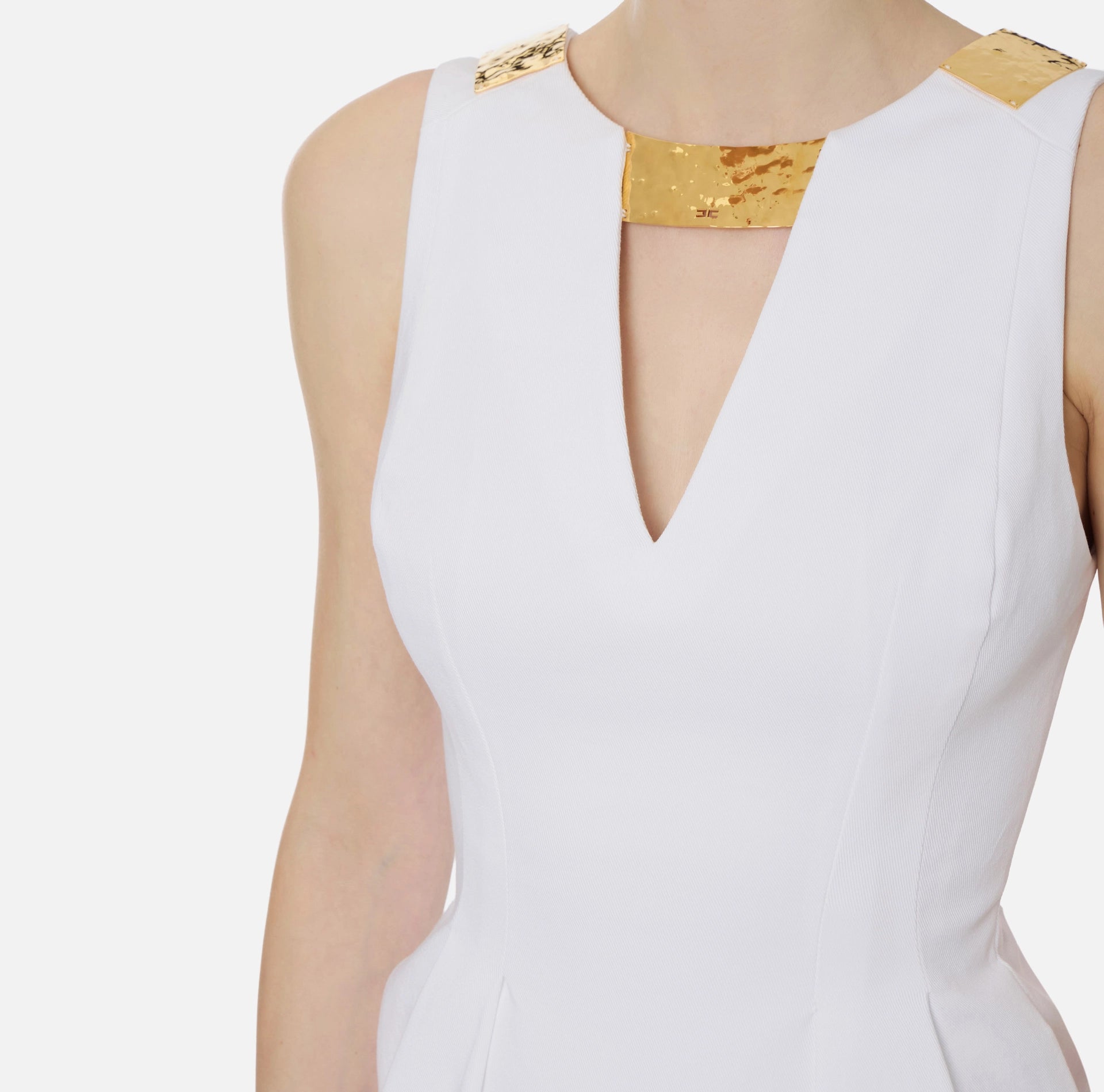 Ivory cotton mini dress with gold plaque