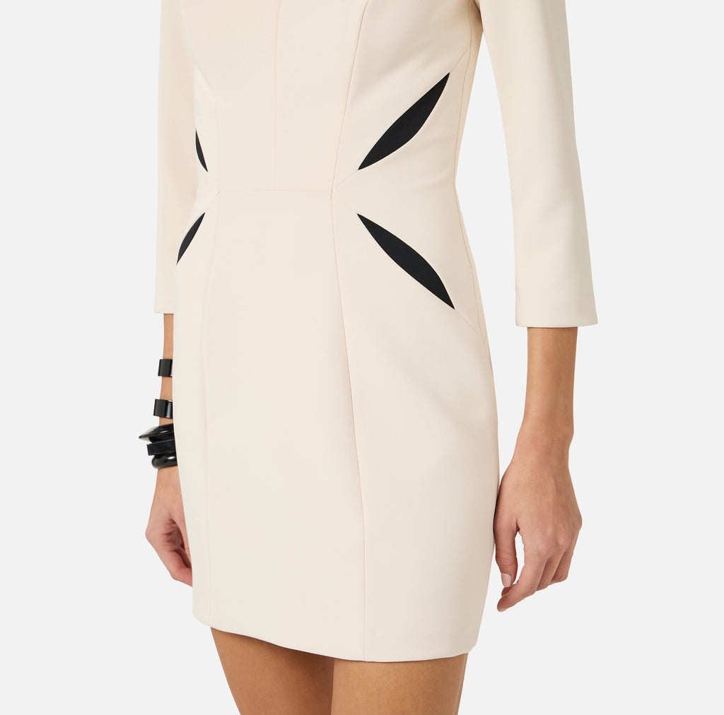 Ivory mini dress with 3/4 sleeves and black insert design