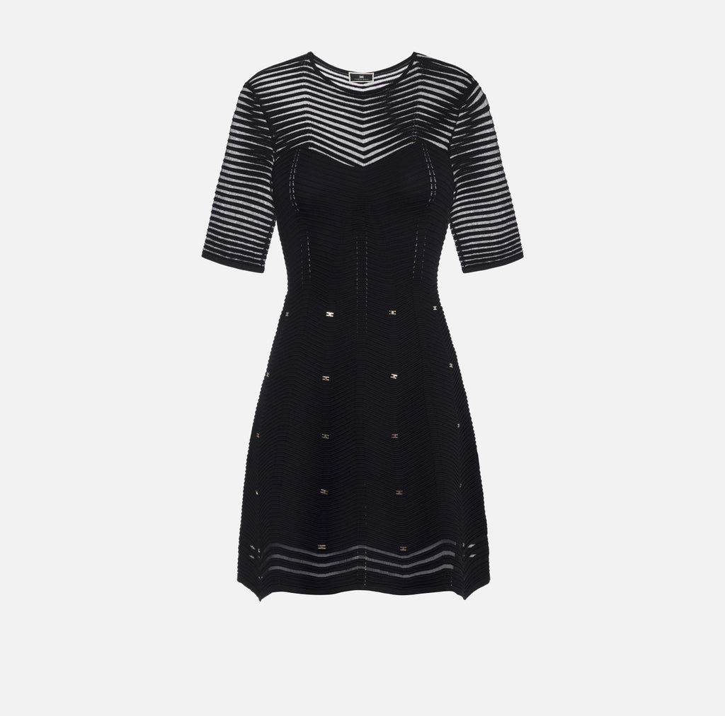 Black herringbone knit mini dress with gold grommet accents
