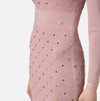 Dusty rose knit mini dress with long sleeves and grommet detail