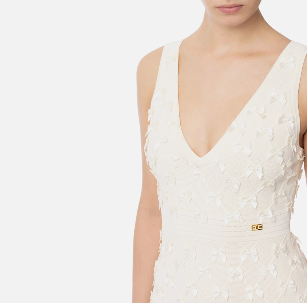 Ivory knit midi dress with micro bows