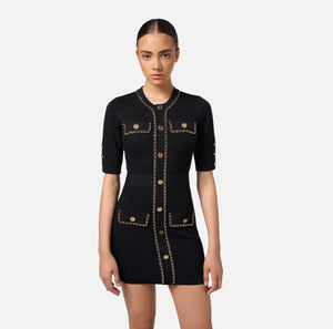 Black mini knit dress with chain embellishment and short sleeves