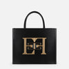 Black medium tote bag in gold maxi plaque