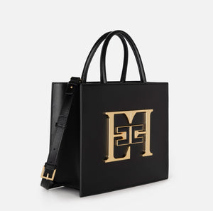 Black medium tote bag in gold maxi plaque