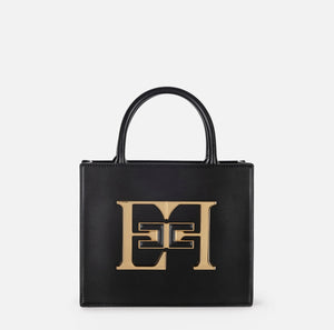 Black small tote bag with gold plaque