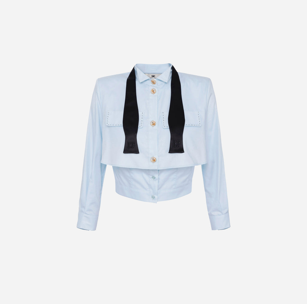 Baby blue  cotton poplin shirt with a bow