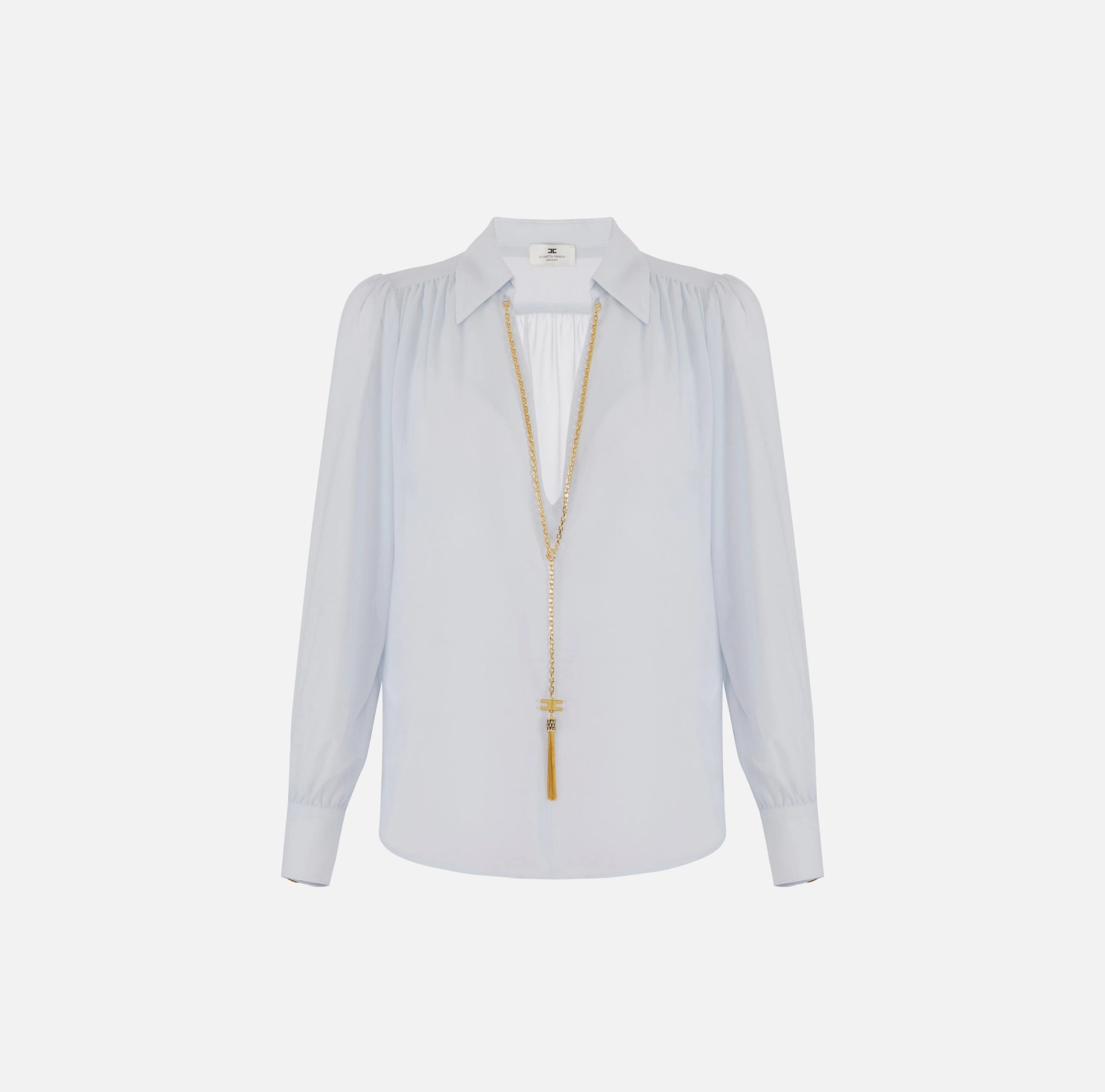 Baby blue blouse with necklace