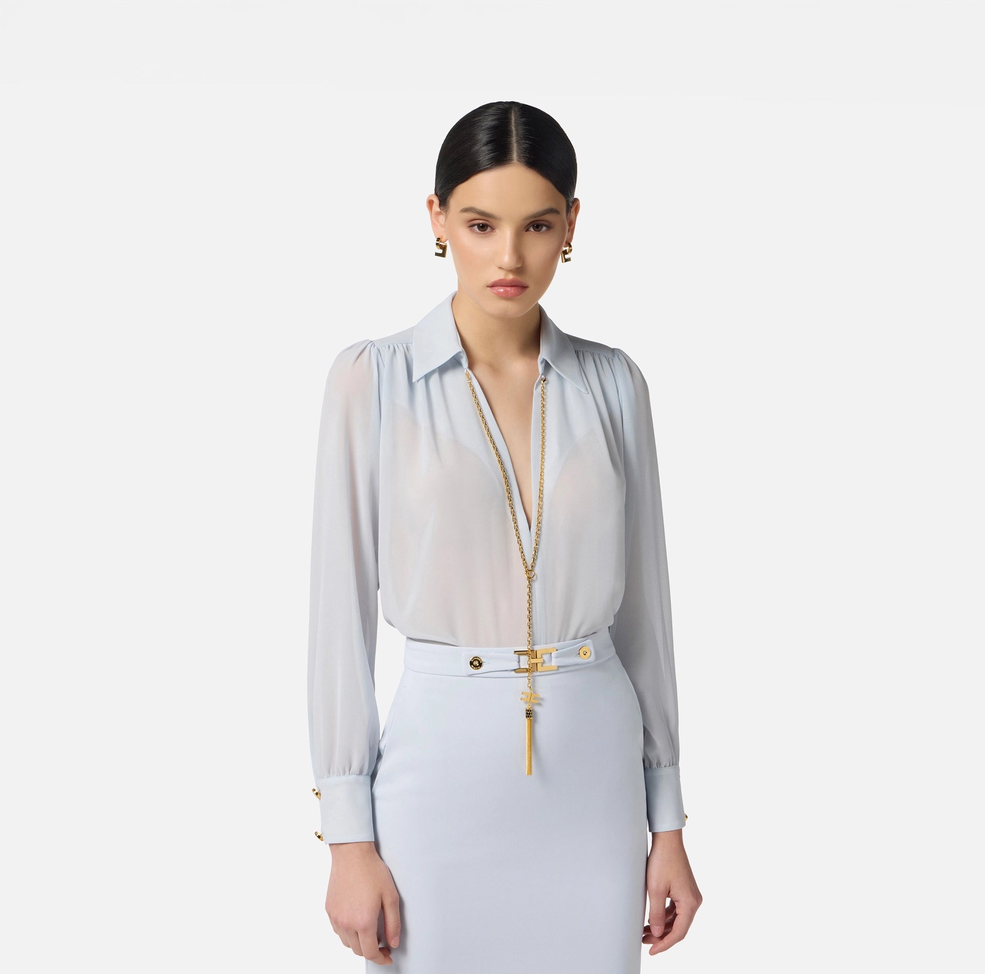 Baby blue blouse with necklace