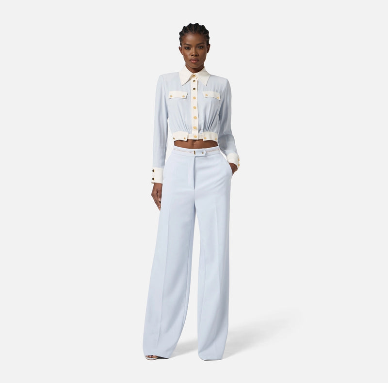 Baby blue short blouse with ivory trimmings