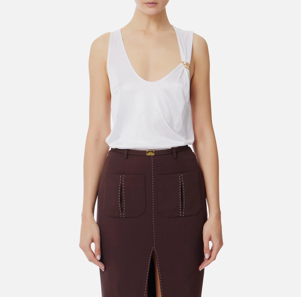 White sleeveless jersey top with gold embelishment