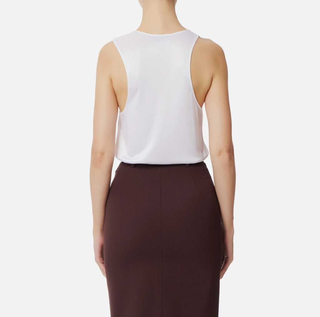 White sleeveless jersey top with gold embelishment