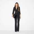 Navy structured jacket with gold buttons and logo details on sleeves