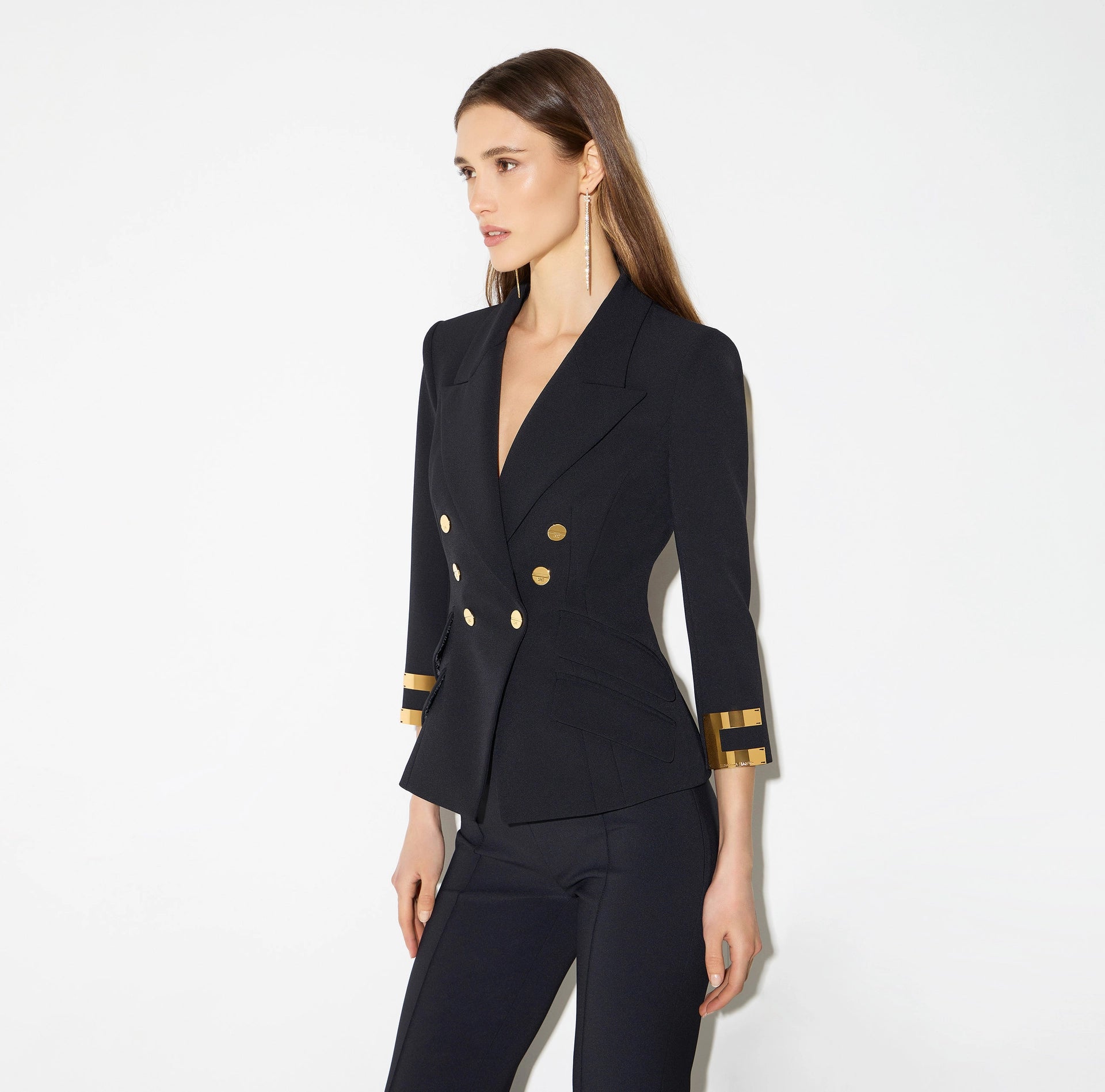 Navy structured jacket with gold buttons and logo details on sleeves
