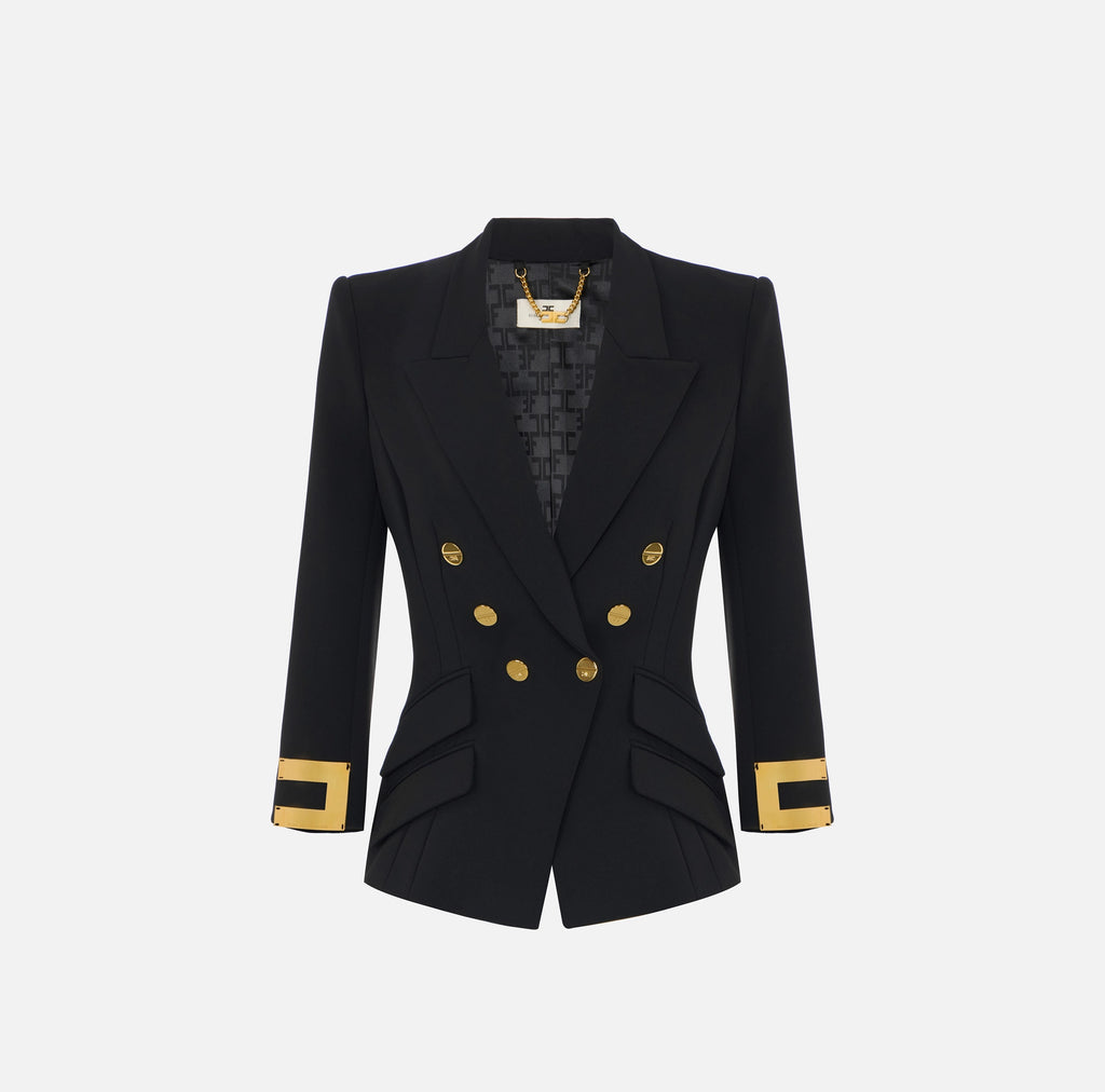 Navy structured jacket with gold buttons and logo details on sleeves