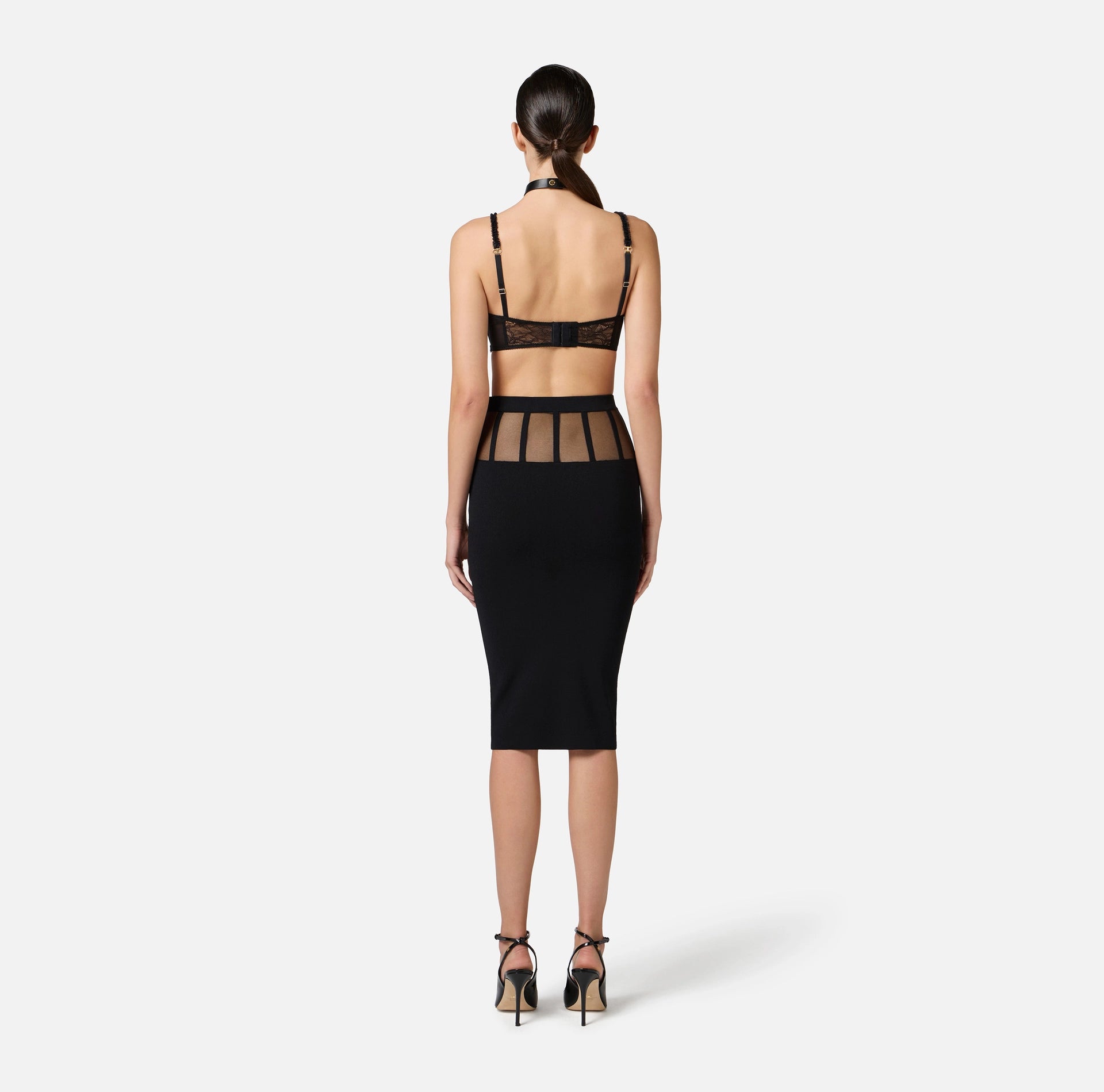 Black pencil skirt with transparent panels