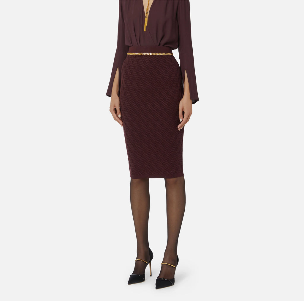 Burgundy knit pencil skirt with gold chain