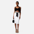White skirt with a scarf belt