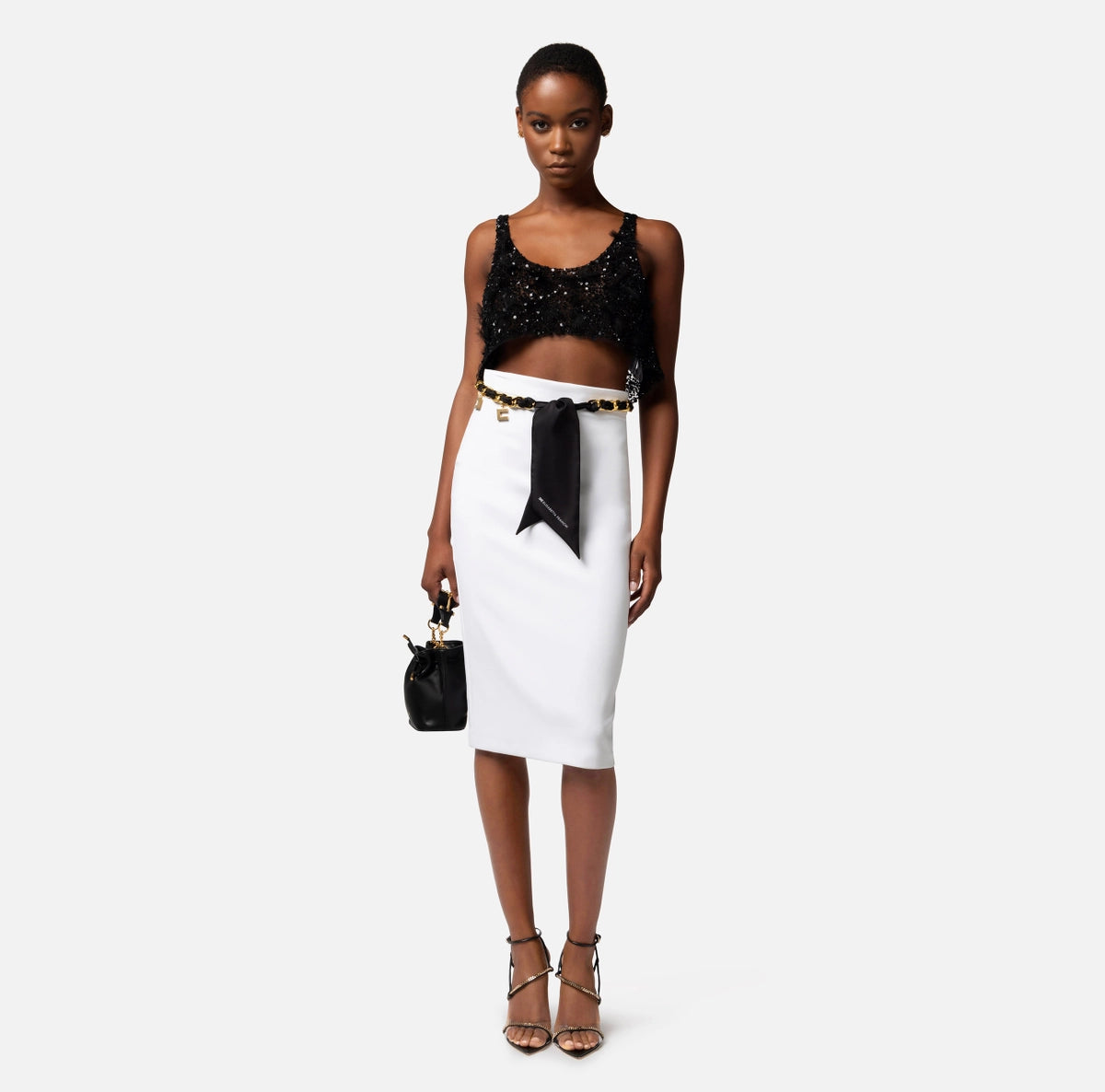 White skirt with a scarf belt