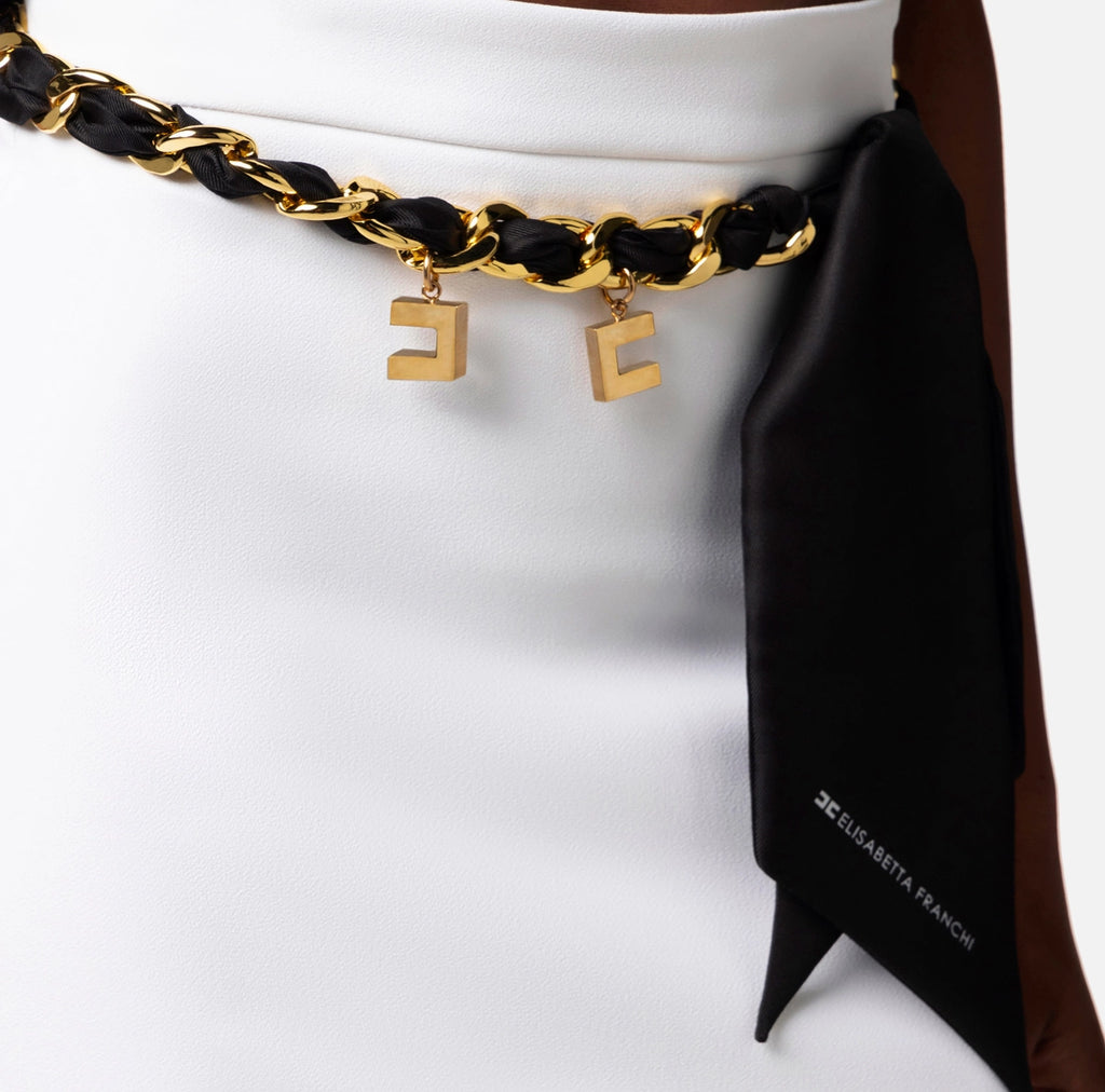 White skirt with a scarf belt