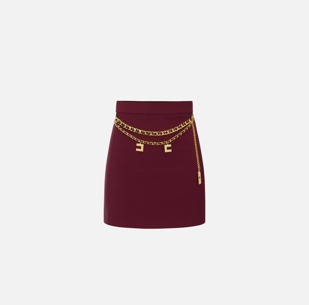 Burgundy mini skirt with chain belt