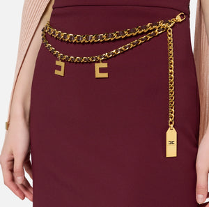 Burgundy mini skirt with chain belt