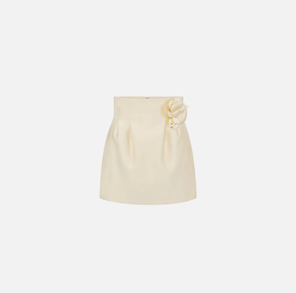 Cream satin mini skirt with flower