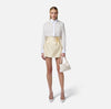 Cream satin mini skirt with flower